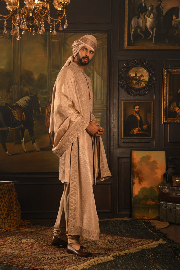 Regal Rose Gold Sherwani: A Fusion Of Dori And Zardozi Embroidery