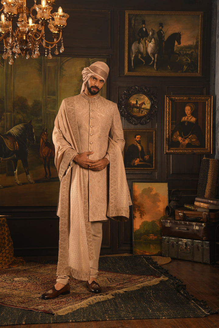 Regal Rose Gold Sherwani: A Fusion Of Dori And Zardozi Embroidery