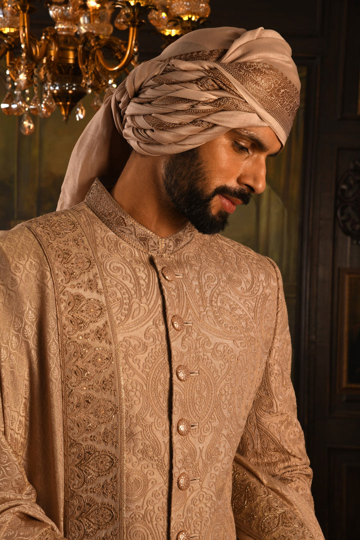 Regal Rose Gold Sherwani: A Fusion Of Dori And Zardozi Embroidery