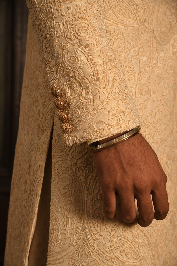 Timeless Heritage Sherwani: A Cream Masterpiece For The Groom