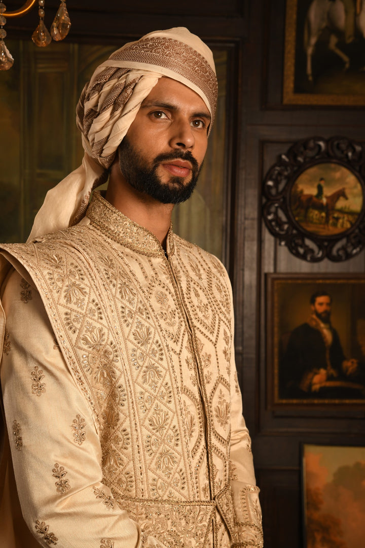 Gilded Geometric: Golden Beige Anarkali Sherwani Of Ceremonial Elegance