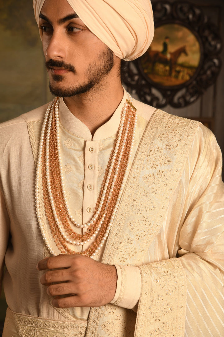 The Imperial Drape Sherwani: A Masterpiece In Light Ivory