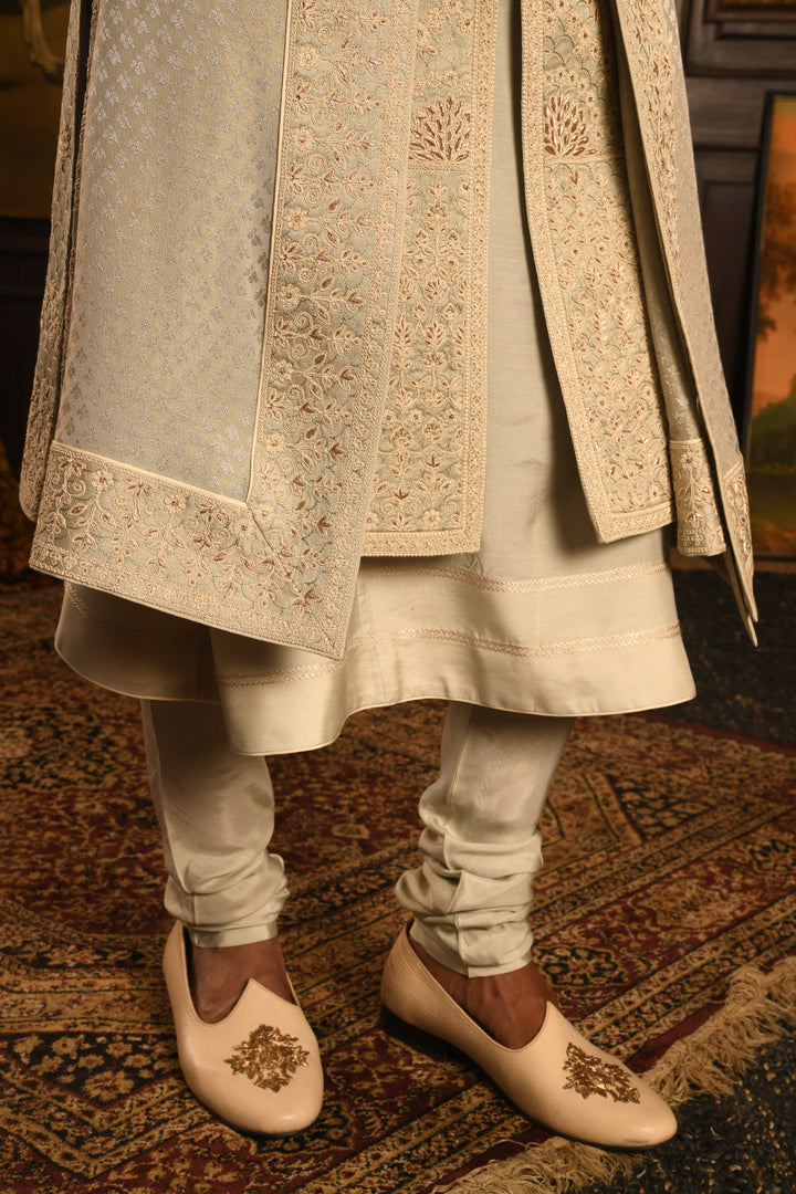 Monochromatic Majesty: Mist Green Anarkali Sherwani Of Refined Elegance
