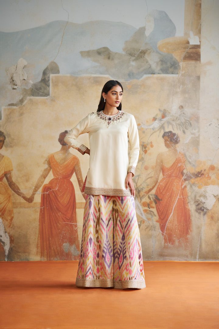 Ivory Jeweled Short Kurta Set In Peach Stones