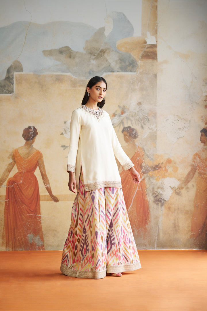 Ivory Jeweled Short Kurta Set In Peach Stones