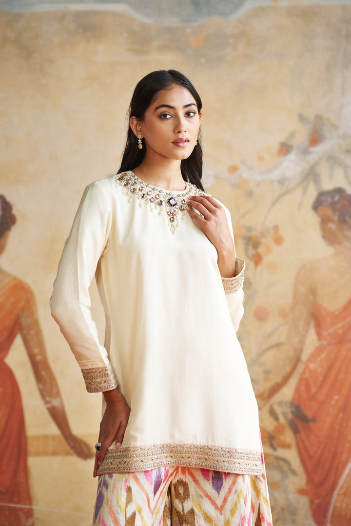 Ivory Jeweled Short Kurta Set In Peach Stones