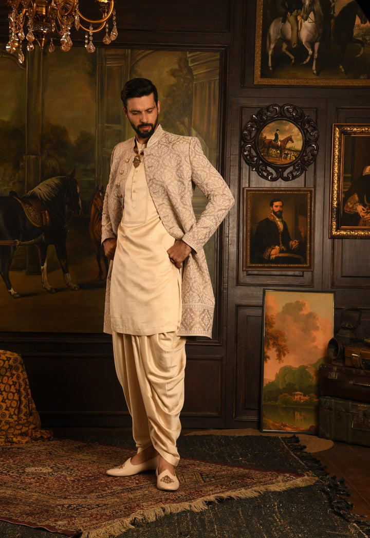 Mughal Tapestry: The Rose Gold Heirloom Sherwani Of Timeless Elegance