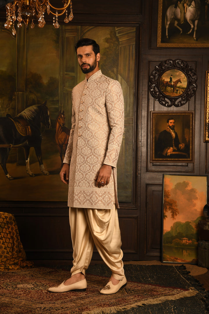 Mughal Tapestry: The Rose Gold Heirloom Sherwani Of Timeless Elegance
