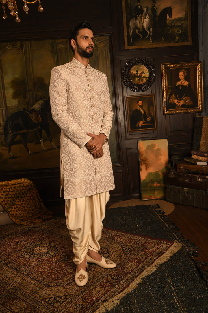 Mughal Tapestry: The Rose Gold Heirloom Sherwani Of Timeless Elegance