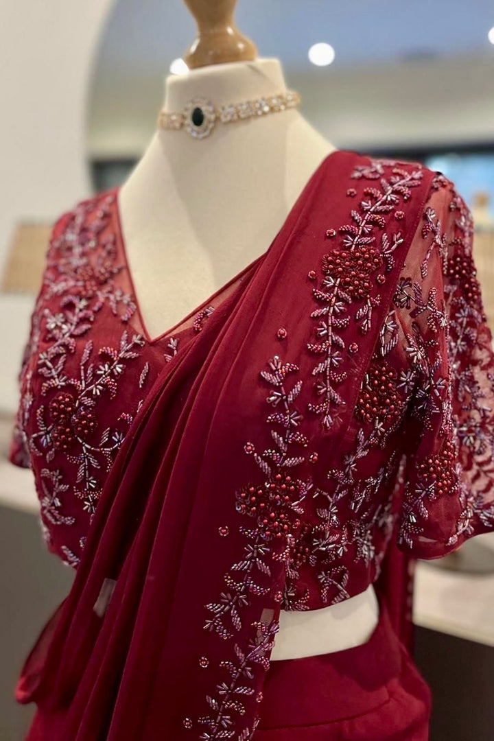 Burgundy Ruffle Saree With Self Embroidery