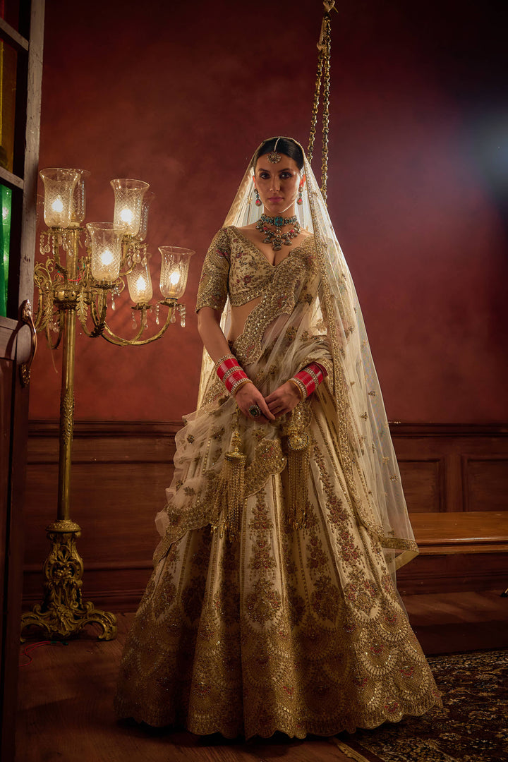 Ivory Raw Silk Hand & Machine Embroidered Lehenga Set