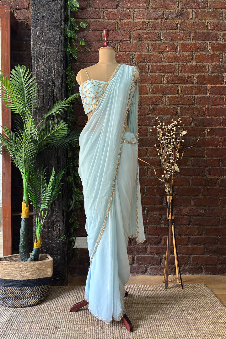 Powder Blue Pre-Draped Saree With Zari Work Bustier