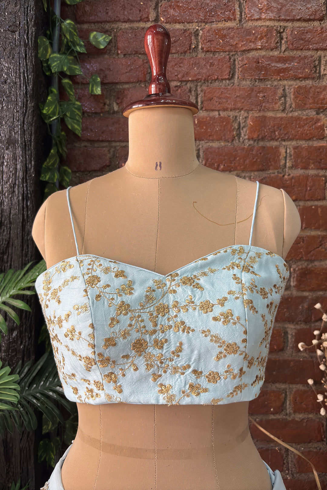 Powder Blue Pre-Draped Saree With Zari Work Bustier