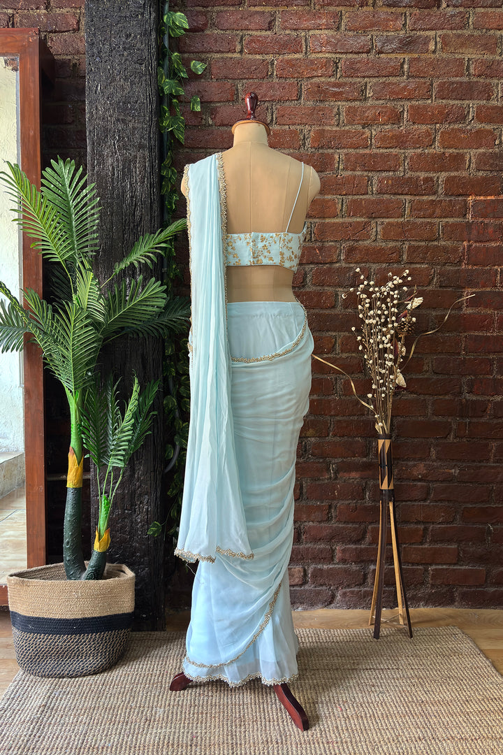 Powder Blue Pre-Draped Saree With Zari Work Bustier