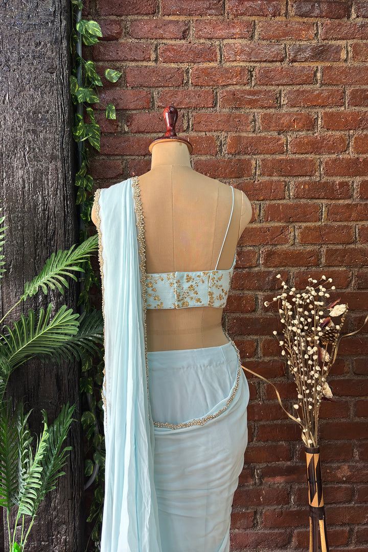 Powder Blue Pre-Draped Saree With Zari Work Bustier