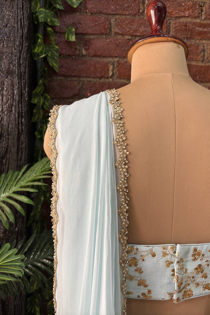Powder Blue Pre-Draped Saree With Zari Work Bustier