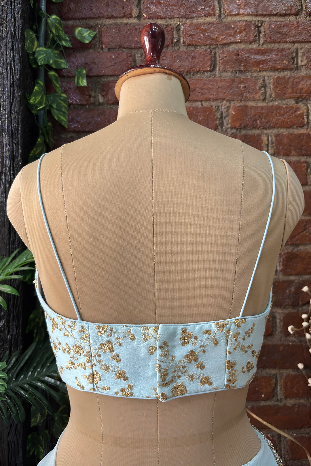 Powder Blue Pre-Draped Saree With Zari Work Bustier