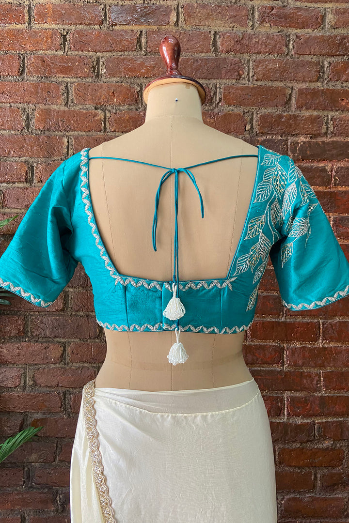 Ivory Tissue Embroidered Saree