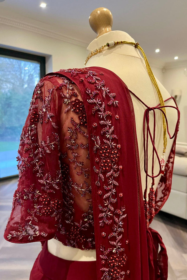 Burgundy Ruffle Saree With Self Embroidery