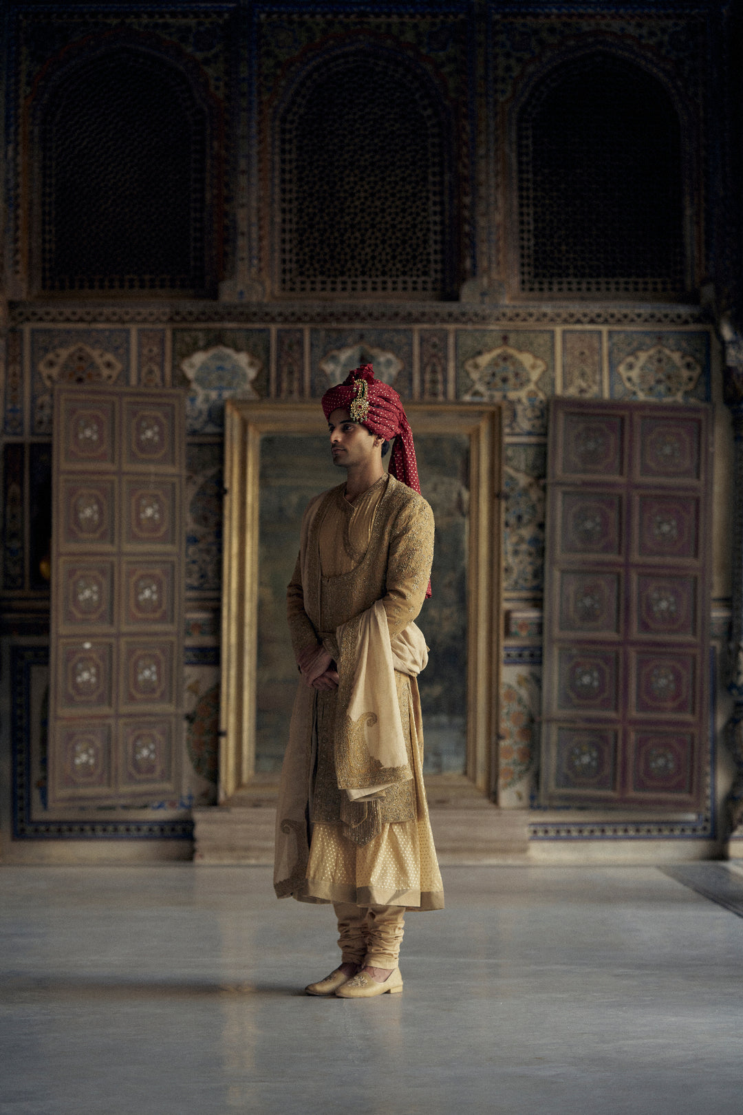 Gold Matka Silk Angrakha Style Sherwani With A Chanderi Booti Choga And Churidar
