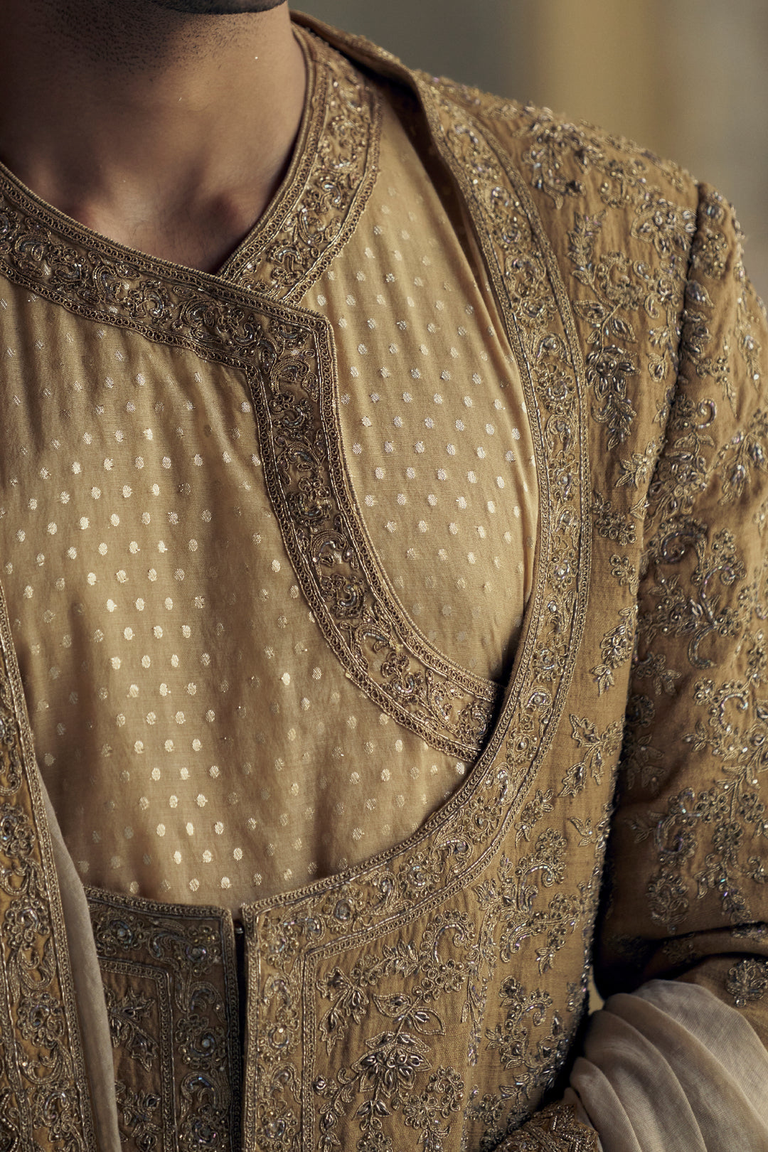 Gold Matka Silk Angrakha Style Sherwani With A Chanderi Booti Choga And Churidar