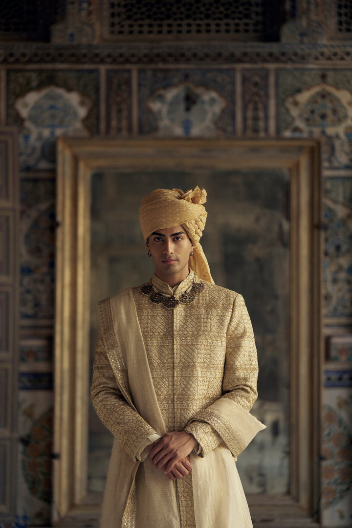 Gold Sherwani Set With Choga And Churidar
