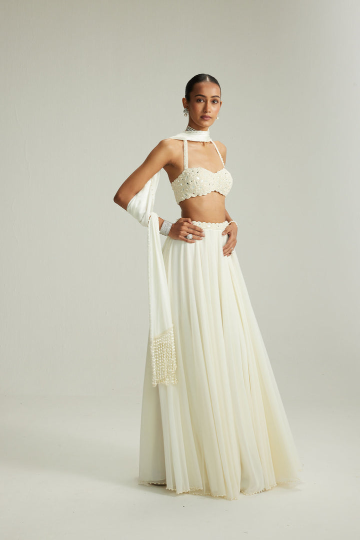 Off White Skirt Set With Halter Neck Blouse