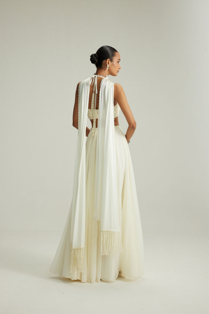 Off White Skirt Set With Halter Neck Blouse