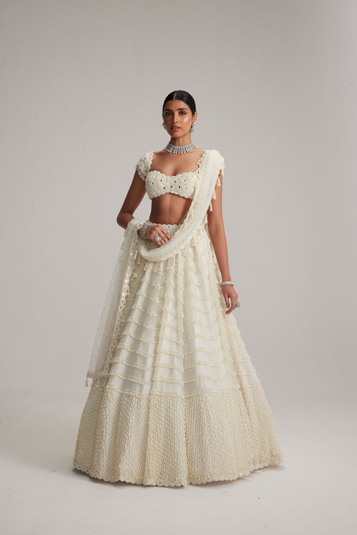 Off White Mirror And Pearl Drop Bridal Lehenga Set