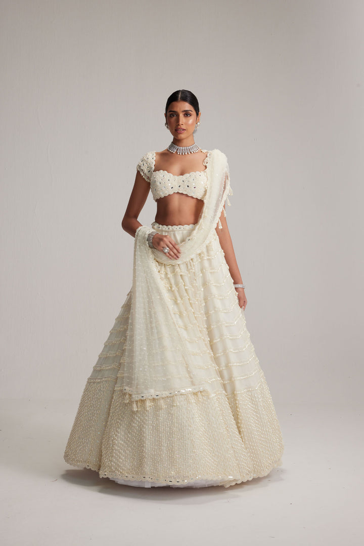 Off White Mirror And Pearl Drop Bridal Lehenga Set