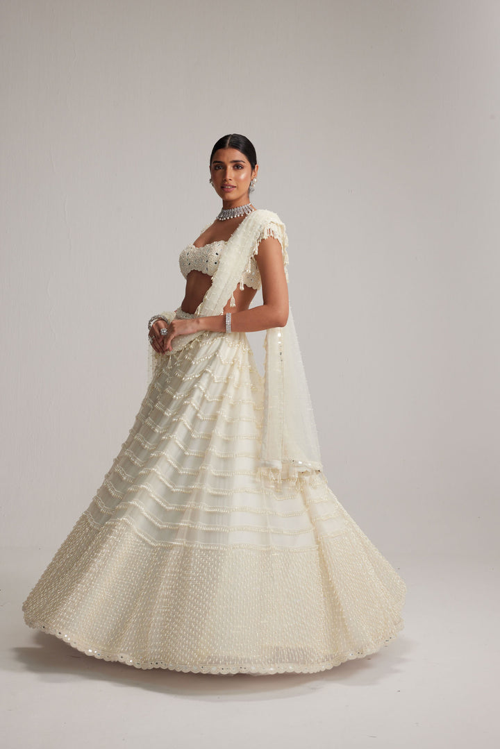 Off White Mirror And Pearl Drop Bridal Lehenga Set