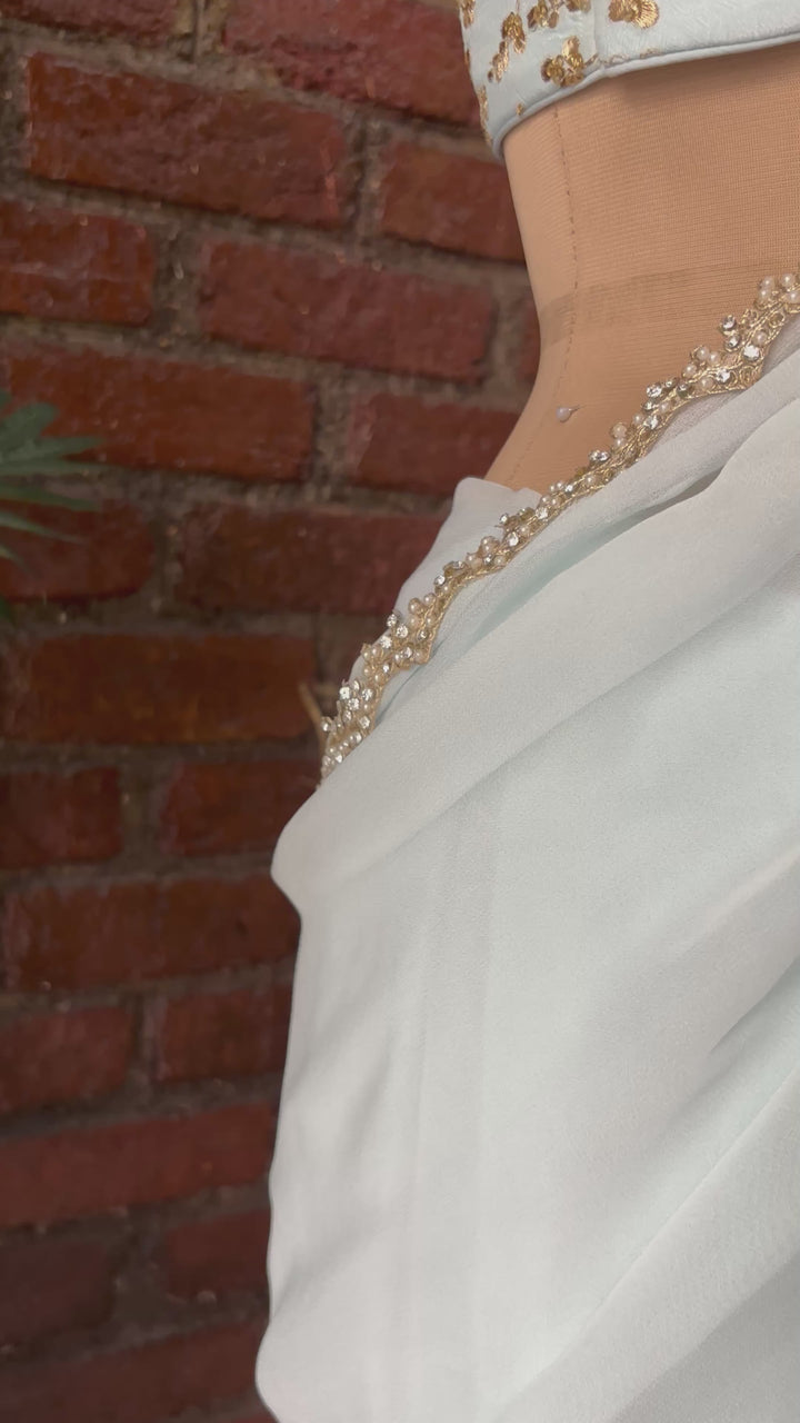 Powder Blue Pre-Draped Saree With Zari Work Bustier