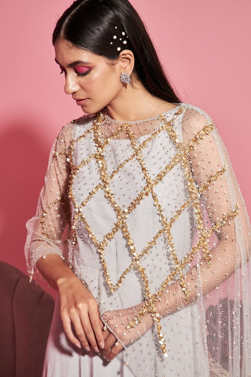 GREY GOWN WITH ASYMMETRICAL CAPE