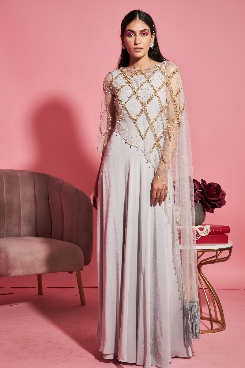 GREY GOWN WITH ASYMMETRICAL CAPE